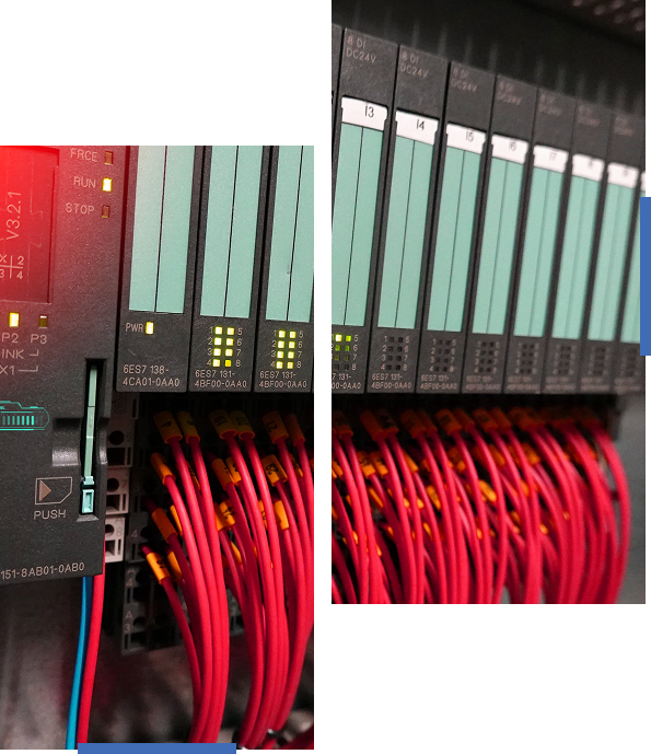 A server rack with red network cables connected to switches.