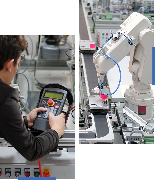 A person operates a robotic arm using a handheld controller.