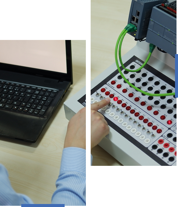 Person interacting with a control panel and laptop in a technical setting.